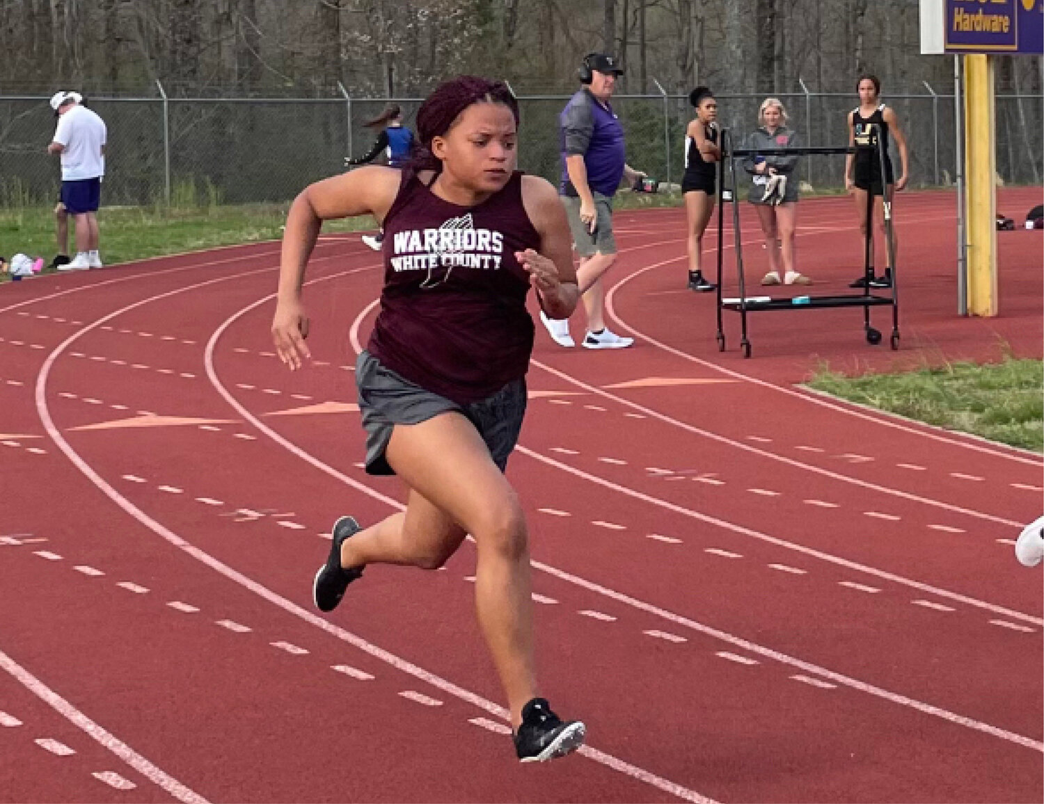 Zoey Clemons competes in the 100M.
